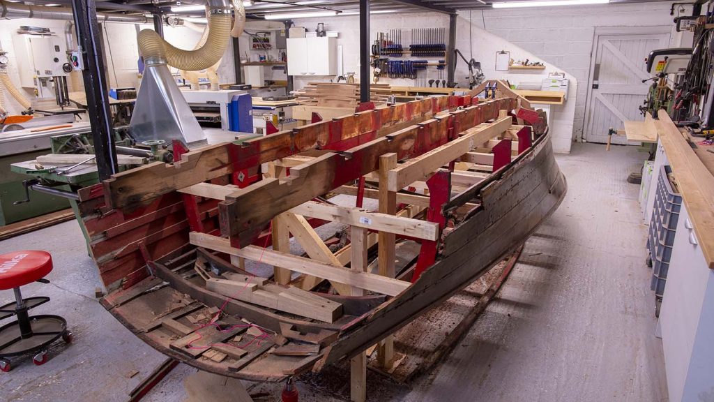Chris Craft restoration currently underway, bottom removed and braced copy